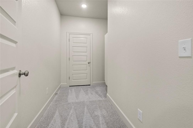 1808 Charles St, Pea Ridge, AR 72751 - hallway featuring light colored carpet and baseboards