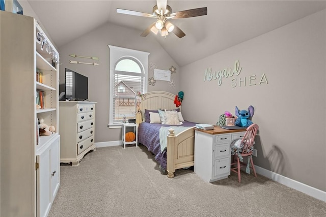 carpeted bedroom with lofted ceiling and ceiling fan