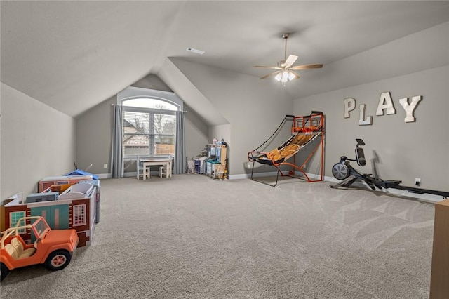 rec room with ceiling fan, lofted ceiling, and carpet flooring