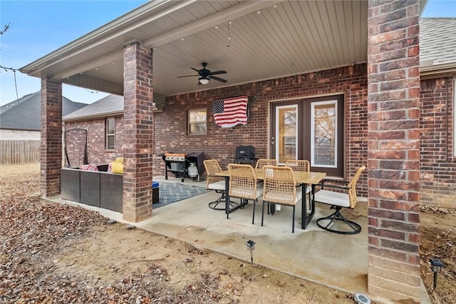 view of patio with grilling area and ceiling fan