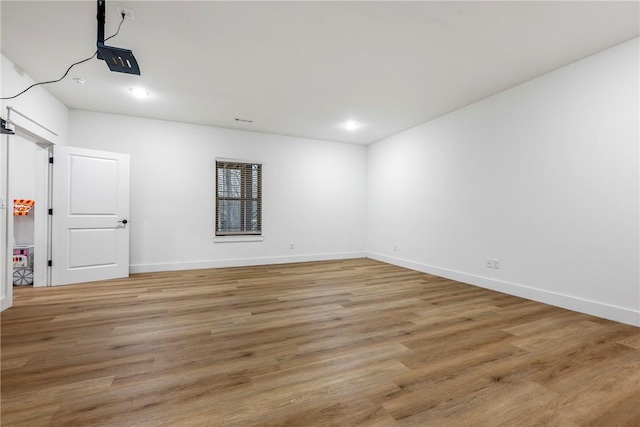 empty room with light wood-type flooring