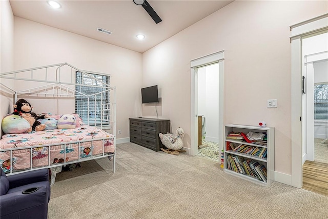 bedroom with ceiling fan and carpet flooring