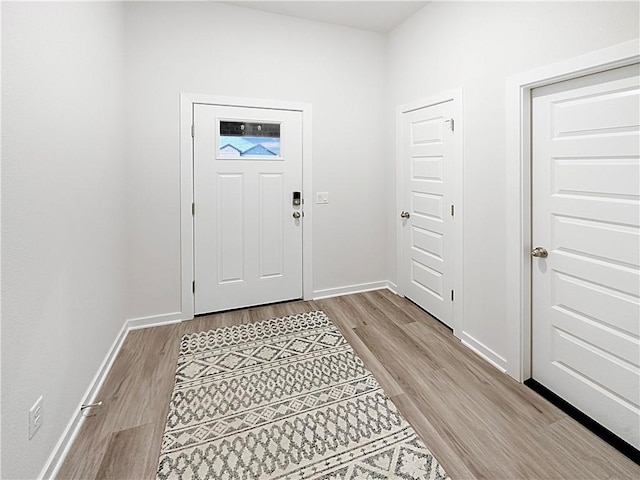 entrance foyer with light hardwood / wood-style flooring