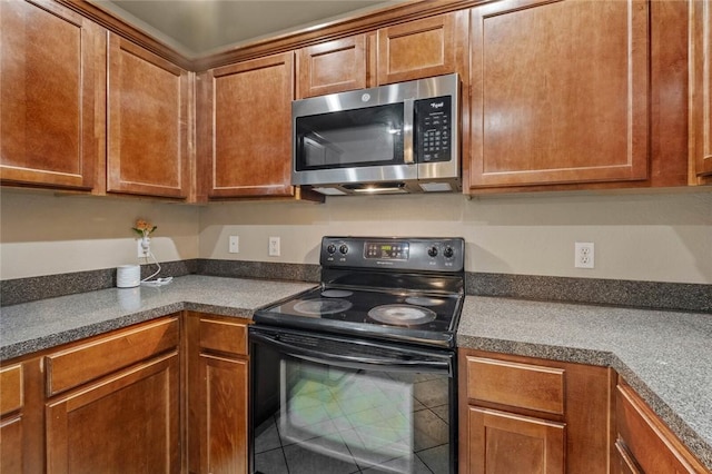 kitchen featuring black electric range oven