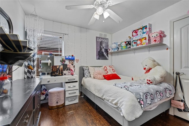 bedroom with dark wood-type flooring and ceiling fan