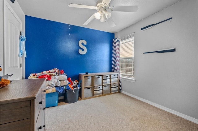 carpeted bedroom with ceiling fan