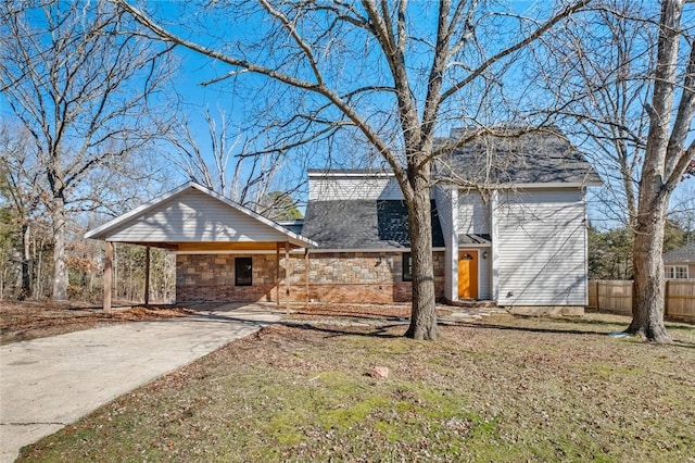 back of house featuring a yard