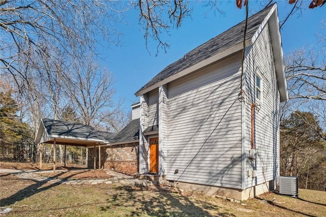 view of home's exterior featuring central AC unit