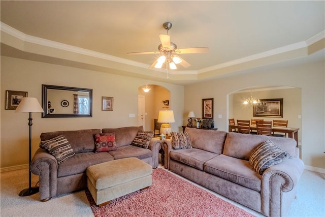 13 Smart Ln, Bella Vista, AR 72715 - living room featuring arched walkways, carpet flooring, ornamental molding, ceiling fan, and baseboards