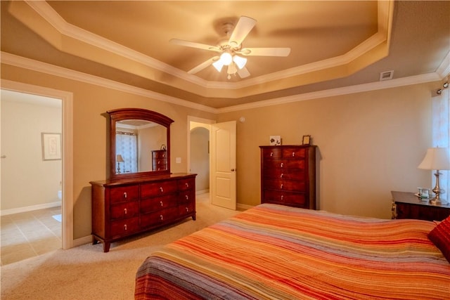 13 Smart Ln, Bella Vista, AR 72715 - bedroom featuring a tray ceiling, light carpet, crown molding, a ceiling fan, and baseboards
