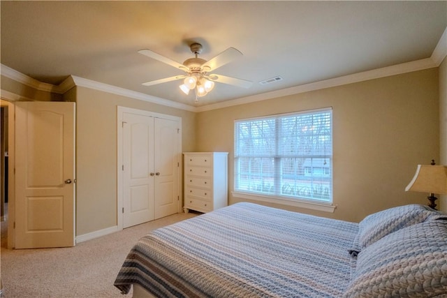13 Smart Ln, Bella Vista, AR 72715 - bedroom with crown molding, baseboards, light carpet, a closet, and ceiling fan