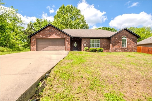 13 Smart Ln, Bella Vista, AR 72715 - ranch-style home with concrete driveway, an attached garage, and brick siding