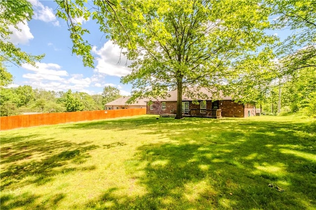 13 Smart Ln, Bella Vista, AR 72715 - view of yard with a wooden deck