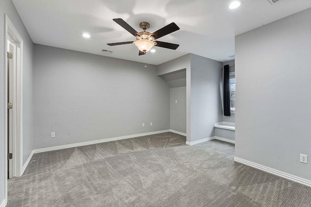 unfurnished bedroom featuring carpet, visible vents, baseboards, and recessed lighting
