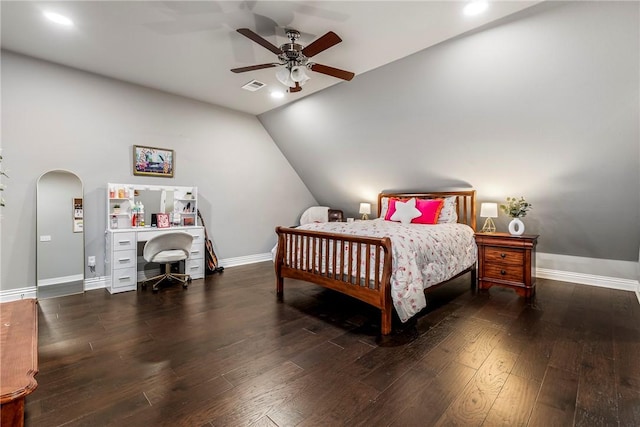 bedroom with vaulted ceiling, ceiling fan, and dark hardwood / wood-style flooring