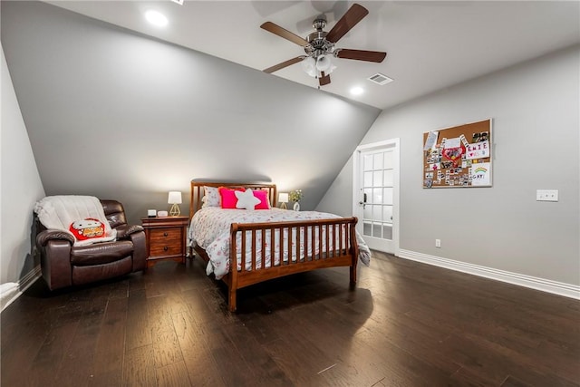 bedroom with ceiling fan, dark hardwood / wood-style flooring, and vaulted ceiling