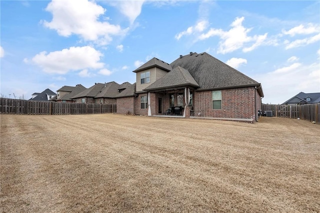 rear view of house with a patio area