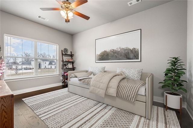 bedroom featuring wood-type flooring and ceiling fan