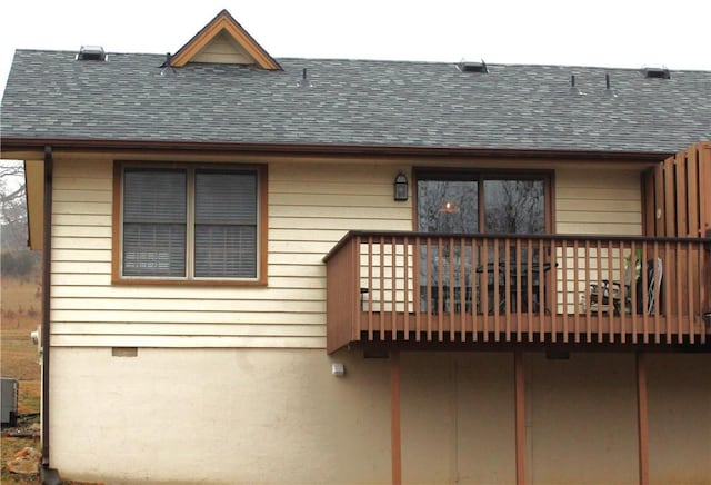 rear view of house featuring a balcony