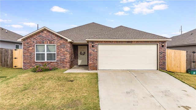 ranch-style home featuring a garage and a front lawn