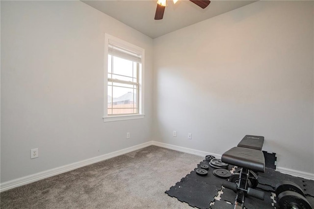 workout room featuring carpet and ceiling fan