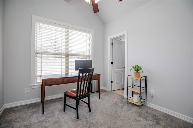 carpeted office featuring ceiling fan and lofted ceiling