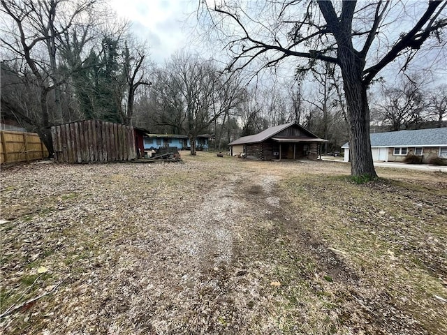 view of yard with an outdoor structure