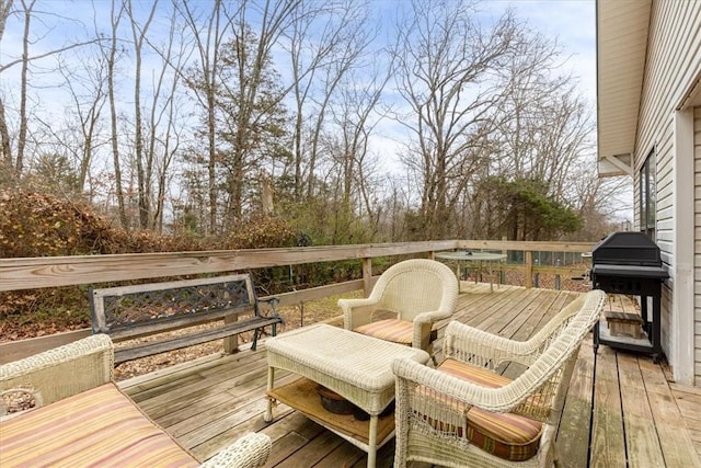 wooden deck with grilling area