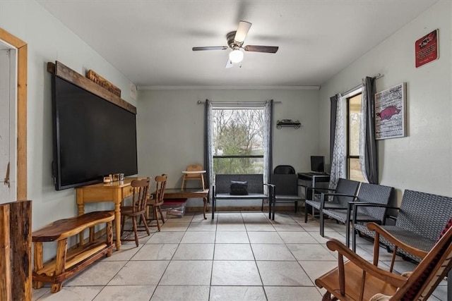 living area featuring light tile patterned floors and ceiling fan