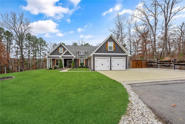 craftsman-style home with a garage and a front lawn