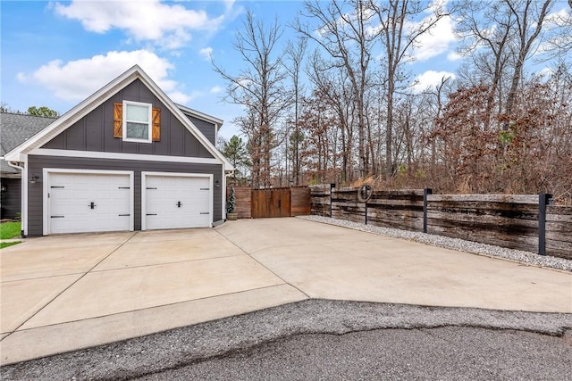 view of property exterior featuring a garage