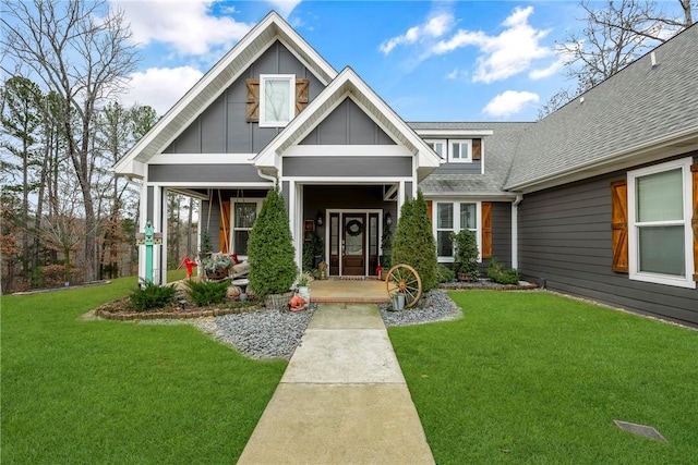 view of front of house featuring a front lawn and a porch