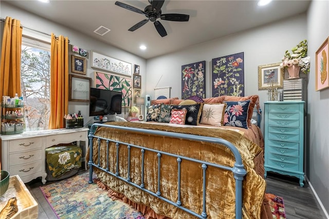 bedroom featuring dark wood-type flooring and ceiling fan