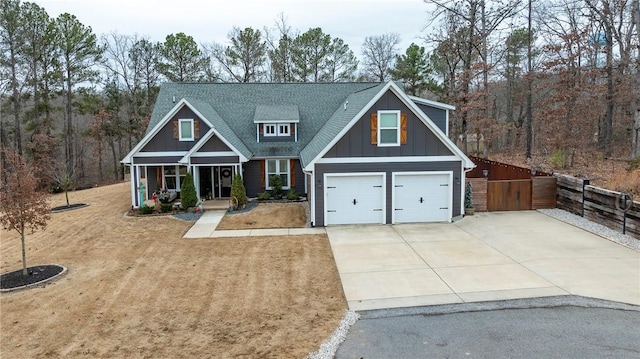 craftsman-style house featuring a garage and covered porch