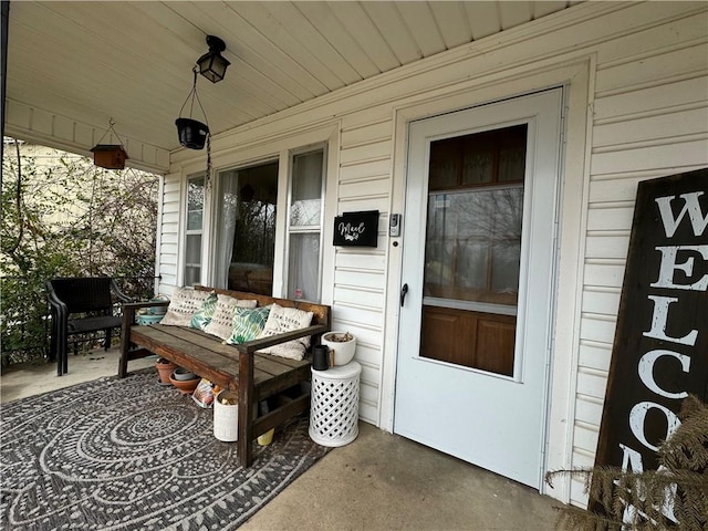 entrance to property featuring a porch