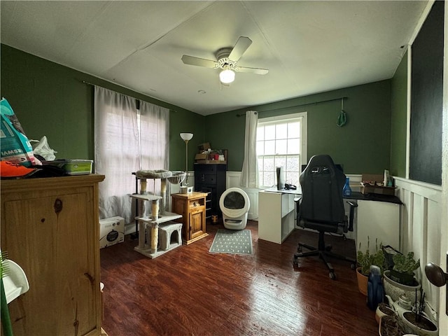 office space featuring ceiling fan and dark hardwood / wood-style flooring