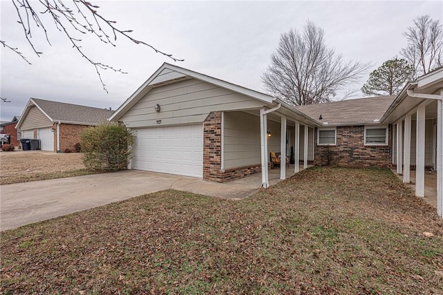 view of side of property with a garage