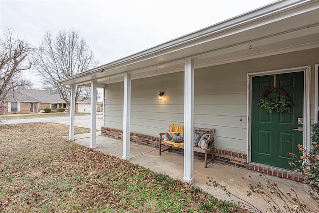 property entrance with a porch