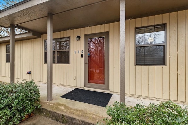 doorway to property with a porch