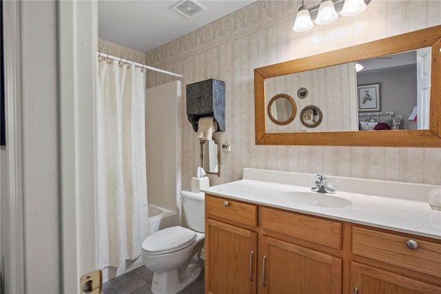 full bathroom with vanity, shower / tub combo, tile patterned floors, and toilet