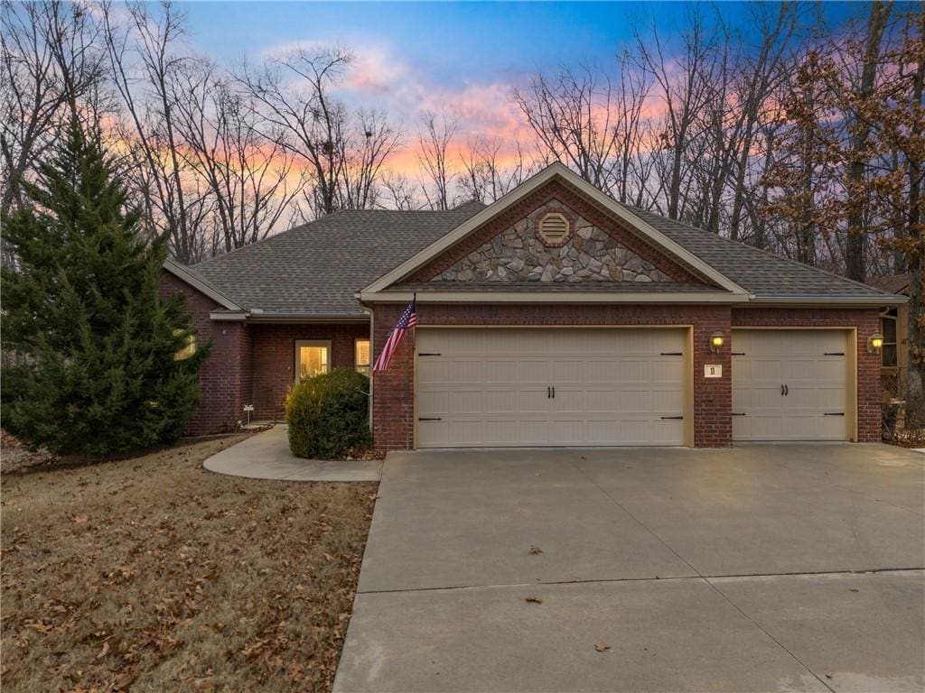 single story home with a garage