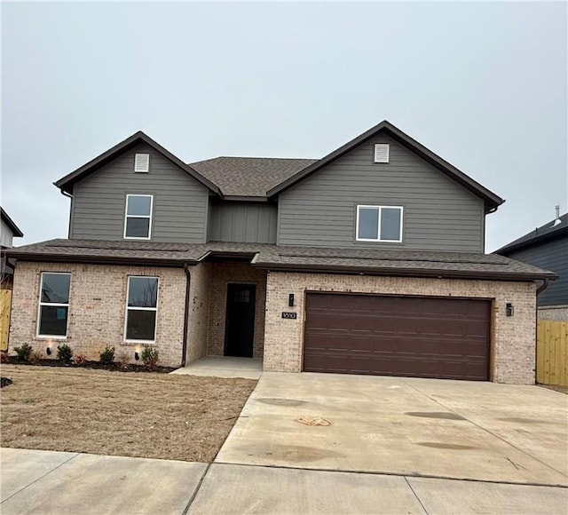 view of front of property featuring a garage