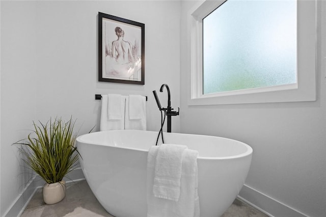738 Cardin Spur, Pea Ridge, AR 72751 - full bath featuring baseboards and a freestanding tub