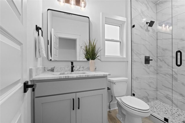 738 Cardin Spur, Pea Ridge, AR 72751 - bathroom with a marble finish shower, vanity, toilet, and a baseboard heating unit