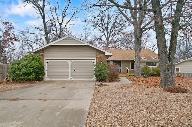 single story home featuring a garage