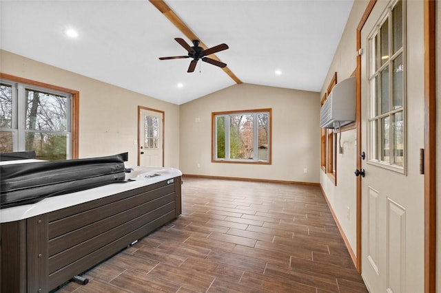 bedroom featuring vaulted ceiling with beams