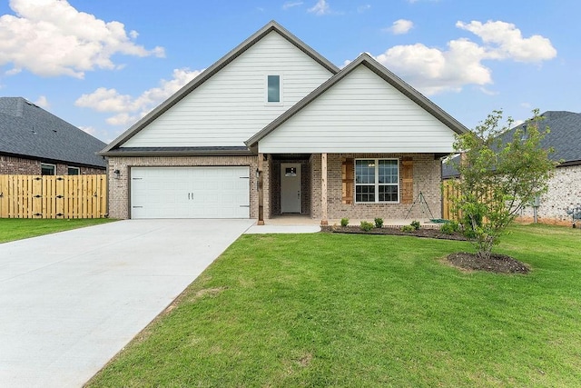 1815 Bugg St, Pea Ridge, AR 72751 - view of front facade featuring concrete driveway and brick siding