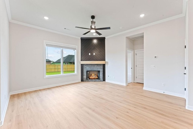 1815 Bugg St, Pea Ridge, AR 72751 - unfurnished living room featuring a ceiling fan, light wood-style floors, baseboards, ornamental molding, and a fireplace