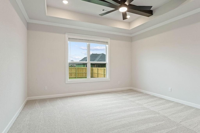 1815 Bugg St, Pea Ridge, AR 72751 - spare room with a raised ceiling, light colored carpet, ceiling fan, baseboards, and recessed lighting