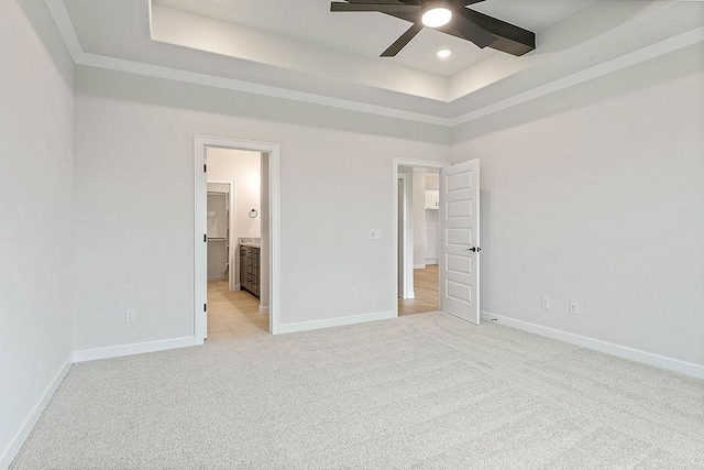 1815 Bugg St, Pea Ridge, AR 72751 - unfurnished bedroom featuring light carpet, a raised ceiling, baseboards, and recessed lighting